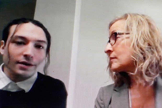 Actor Ezra Miller, left, is seated with attorney Lisa Shelkrot, right, as they appear Monday, Oct. 17, 2022, in a livestream video remotely from Burlington, Vt., during Miller's arraignment at superior court, in Bennington, Vt. Miller has pleaded not guilty to stealing bottles of liquor from a neighbor's home in Vermont.
Mandatory Credit:	Steven Senne/AP