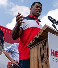 Georgia Republican Senate nominee Herschel Walker, pictured on October 11, in Carrollton, Georgia said as recently as August that he opposes any exceptions to a ban on abortion, despite stating the opposite during his first and only debate against Democratic Sen. Raphael Warnock last week.
Mandatory Credit:	Elijah Nouvelage/Getty Images