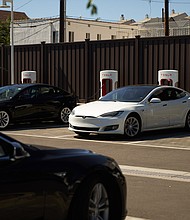 Tesla pictured on September 22, in Santa Monica, California, posted improved third quarter earnings that were generally in line with Wall Street forecasts, but profits were still just short of where they were at the start of the year before supply chain problems ate into its production and sales.
Mandatory Credit:	Allison Dinner/Getty Images