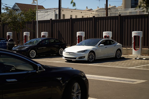 Tesla pictured on September 22, in Santa Monica, California, posted improved third quarter earnings that were generally in line with Wall Street forecasts, but profits were still just short of where they were at the start of the year before supply chain problems ate into its production and sales.
Mandatory Credit:	Allison Dinner/Getty Images