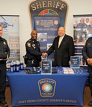 The Fort Bend County Sheriff’s Foundation provided funds to support the Fort Bend County Sheriff’s Office’s recruiting efforts. The funds were used to purchase branded marketing collateral to attract and retain additional deputies, dispatchers, and detention officers. Pictured are Patrol Major James Burger, Sheriff Eric Fagan, Foundation Board President Dave Moss, and Recruiting Deputy Frank Davis.