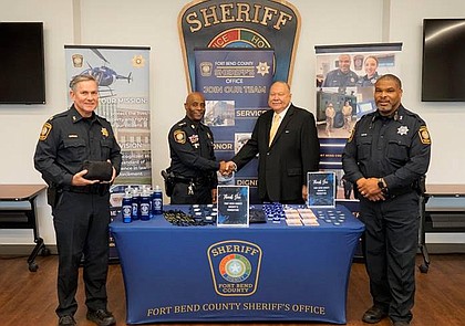 The Fort Bend County Sheriff’s Foundation provided funds to support the Fort Bend County Sheriff’s Office’s recruiting efforts. The funds were used to purchase branded marketing collateral to attract and retain additional deputies, dispatchers, and detention officers. Pictured are Patrol Major James Burger, Sheriff Eric Fagan, Foundation Board President Dave Moss, and Recruiting Deputy Frank Davis.