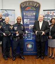 Fort Bend County Sheriff Eric Fagan and his team receive a donation from the Fort Bend County Sheriff’s Foundation Board President Dave Moss and Board members Andrea Tolbert, James Brown, Jr., and FBCSO Assistant Chief Deputy Manuel Zamora.