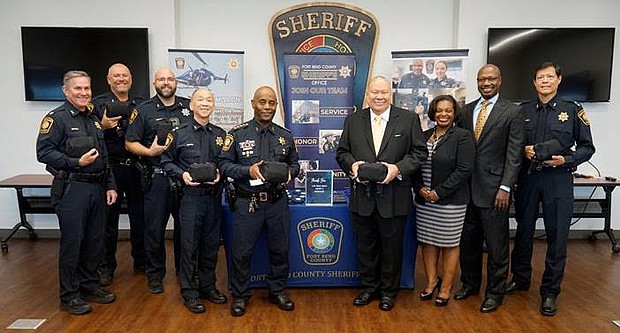 Fort Bend County Sheriff Eric Fagan and his team receive a donation from the Fort Bend County Sheriff’s Foundation Board President Dave Moss and Board members Andrea Tolbert, James Brown, Jr., and FBCSO Assistant Chief Deputy Manuel Zamora.