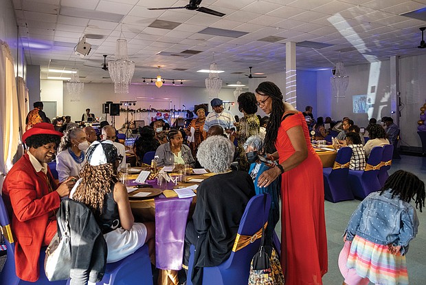 Family and friends celebrate the 100th birthday of family matriarch. Rose Ann Perry Parker at A Touch of Class event space in Henrico County on Oct. 15.