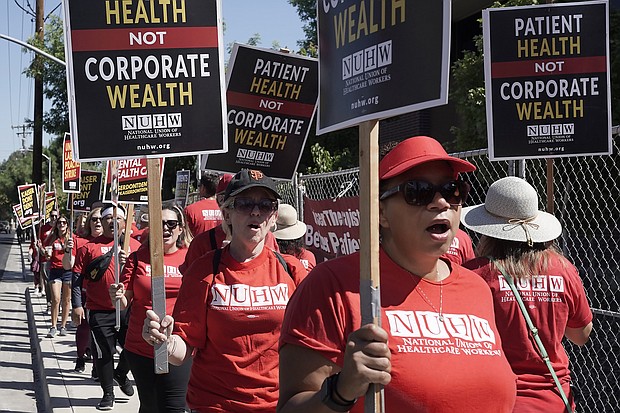 California mental health workers vote Friday to end the 10-week strike. Kaiser Permanente mental health workers and supporters here march outside a Kaiser facility in Sacramento, California, on August 15.
Mandatory Credit:	Rich Pedroncelli/AP