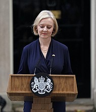 Britain's Prime Minister Liz Truss announces her resignations in Downing Street in London, on October 20.
Mandatory Credit:	Kirsty O'Connor/PA/AP