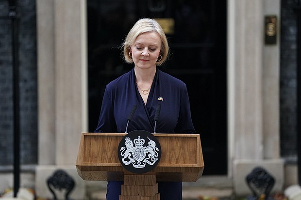 Britain's Prime Minister Liz Truss announces her resignations in Downing Street in London, on October 20.
Mandatory Credit: Kirsty O'Connor/PA/AP