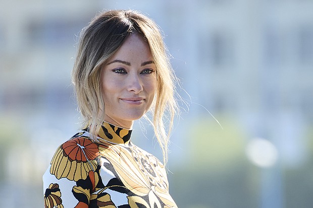 Actress Olivia Wilde, here in San Sebastian, Spain, on September 17, gets support after claim she abandoned her rescue dog.
Mandatory Credit:	Carlos Alvarez/Getty Images