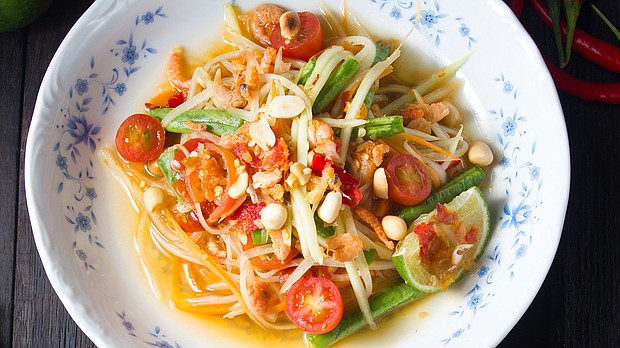 The world's best spicy foods includes a green papaya salad with a fiery kick.
Mandatory Credit: pattarasiri virayasi/Adobe Stock