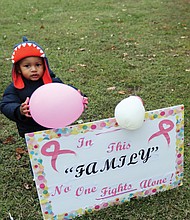 In recognition of October as National Breast Cancer Awareness Month, Mrs. Williams started her first “Robin’s Walk” in October 2020. On Oct. 23, she was joined by family and friends who have shown up each year to support her wellness journey and to build awareness about the disease. Despite the chilly, drizzly afternoon at Henrico County’s Osborne Park, Ms. Williams, along with family (including 18-month-old Kaleb Quivers shown holding a balloon) and friends, completed a 1-mile loop around the park before returning to a picnic shelter for lunch, pink cupcakes (baked by Myra Nelson, Mrs. Williams’ cousin), games and fellowship.