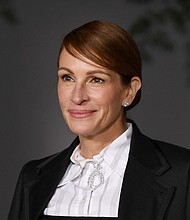 The story of Martin Luther King Jr. and his wife covering the hospital expenses for Julia Roberts's birth has been a revelation to many, but it was just a start of a connection between the actress and social causes. Roberts is seen here on October 15.
Mandatory Credit:	Jon Kopaloff/Getty Images