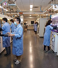 GM Research and Development battery surface coating lab
GM electrochemists working on future battery technology at the company's Research and Development battery surface coating lab in Warren, Michigan. (Photo by Jenny Risher for General Motors)
