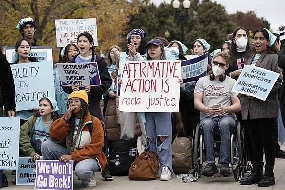 The survival of affirmative action in higher education appeared to be in serious trouble Monday at a conservative-dominated Supreme Court ...