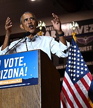 Former US President Barack Obama speaks during a campaign event in Phoenix, Arizona, on November 2.
Mandatory Credit: Patrick T. Fallon/AFP/Getty Images