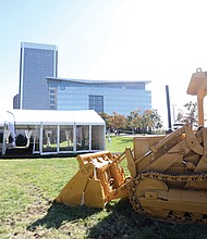 A ceremonial mechanical excavator is on site for the groundbreaking at the CoStar Group’s campus in Downtown Richmond in front of the current CoStar headquarters building at 5th and Tredegar streets. CoStar, founded in 1987, provides commercial real estate information, analytics, and online marketplaces for real estate transactions. Community partners, CoStar employees and the public witnessed the ceremonial groundbreaking and announcements about the $460 million project that is projected to bring at least 2,000 new jobs to the area.