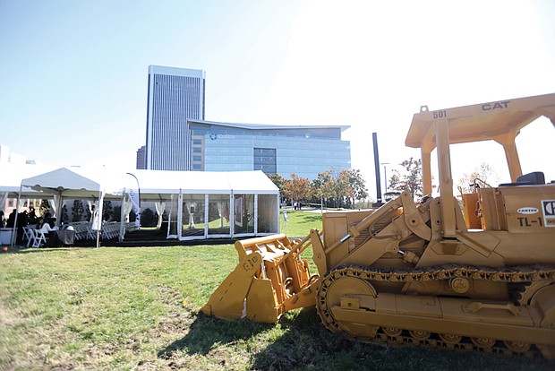 A ceremonial mechanical excavator is on site for the groundbreaking at the CoStar Group’s campus in Downtown Richmond in front of the current CoStar headquarters building at 5th and Tredegar streets. CoStar, founded in 1987, provides commercial real estate information, analytics, and online marketplaces for real estate transactions. Community partners, CoStar employees and the public witnessed the ceremonial groundbreaking and announcements about the $460 million project that is projected to bring at least 2,000 new jobs to the area.