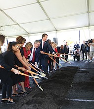 Gov. Glenn Youngkin, Richmond Mayor Levar Stoney, CoStar Group founder and CEO Andy Florence, Secretary of Commerce and Trade for the Commonwealth of Virginia, Caren Merrick, Richmond City Councilperson Ellen Robertson, and Economic Development Director for the City of Richmond Leonard Sledge dig in Tuesday for the groundbreaking for CoStar’s $460 million expansion project. Joining them were Richmond City Council members Katherine Jordan, left, and Ann-Frances Lambert and First Lady Suzanne S. Youngkin also attended the ceremony.