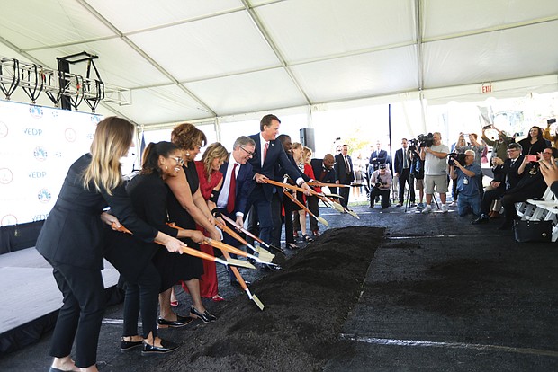 Gov. Glenn Youngkin, Richmond Mayor Levar Stoney, CoStar Group founder and CEO Andy Florence, Secretary of Commerce and Trade for the Commonwealth of Virginia, Caren Merrick, Richmond City Councilperson Ellen Robertson, and Economic Development Director for the City of Richmond Leonard Sledge dig in Tuesday for the groundbreaking for CoStar’s $460 million expansion project. Joining them were Richmond City Council members Katherine Jordan, left, and Ann-Frances Lambert and First Lady Suzanne S. Youngkin also attended the ceremony.