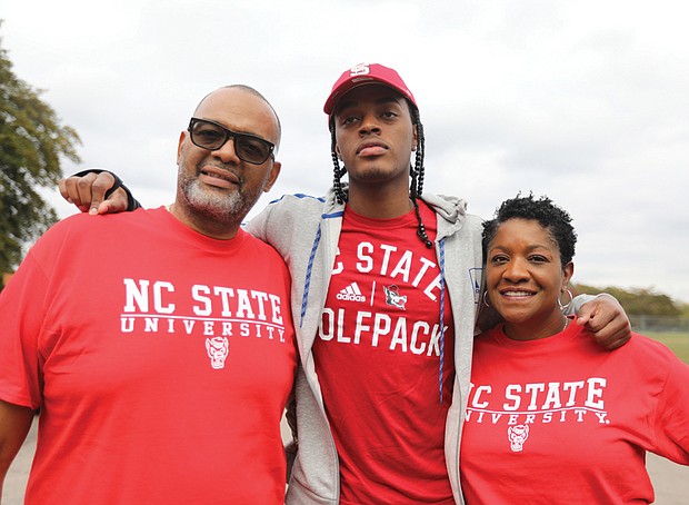Dennis Parker Jr., a standout scholar and basketball star, was joined by his mother, Andrea Parker, and his father Dennis Parker Sr.