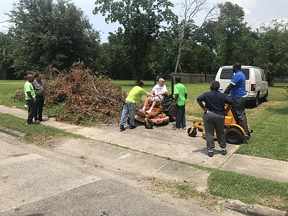 Former Houston City Council Members Jack Christie and Jerry Davis join the SmartScaping Cares team to help a veteran with his yard 

Photo: SmartScaping Landscape & Design