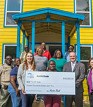 Representatives from Austin Bank, Texas N.A. and the Federal Home Loan Bank of Dallas awarded $16,000 in partnership grant program funds to TUFF Kids, a nonprofit in Cleveland, Texas.