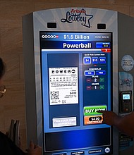 The "world's largest lotto prize ever offered" -- an estimated $1.6 billion jackpot -- is now at stake in Saturday's Powerball drawing. People purchase lottery tickets inside the Phoenix Sky Harbor International Airport in Arizona, on November 3.
Mandatory Credit: Patrick T. Fallon/AFP/Getty Images