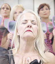 A Calendar Girls dance routine involving handheld mirrors and pink leopard outfits.
Mandatory Credit: Love Martinsen