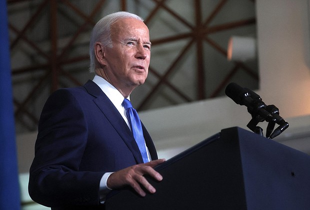 President Joe Biden was 'expressing solidarity' when he said 'we're going to free Iran,' White House says. Biden here speaks during a Democratic National Committee event in Washington, on November 2.
Mandatory Credit:	Leah Millis/Reuters