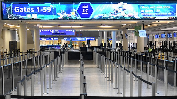 On November 9, some Florida airports and theme parks were halting operations as Tropical Storm Nicole advanced toward the eastern coast of Florida. An empty TSA screening line is seen at Orlando International Airport on September 28 ahead of Hurricane Ian.
Mandatory Credit: Paul Hennessy/SOPA Images/LightRocket/Getty Images