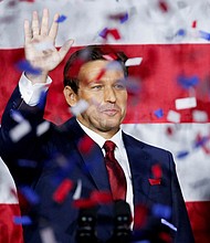 Republican Florida Governor Ron DeSantis celebrates onstage during his 2022 midterm elections night party in Tampa, Florida, November 8.
Mandatory Credit:	Marco Bello/Reuters