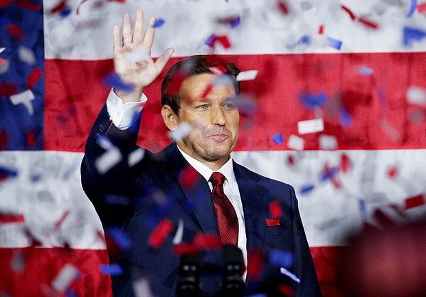 Republican Florida Governor Ron DeSantis celebrates onstage during his 2022 midterm elections night party in Tampa, Florida, November 8.
Mandatory Credit: Marco Bello/Reuters