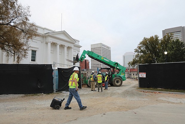 Construction continues at Virginia’s Capitol Square as seen here last month. The Capitol Visitor Center has been closed to the public since May 2 for numerous projects. According to a press release from the Department of General Services, the closure is expected to continue until next month, during which time the historic Capitol will remain open. All visitors must use the west entrance to the Capitol, where they are screened upon entry. Buses, tour groups and other large multiple-passenger vehicles can unload on the eastern-most lane of 9th Street near the Capitol Square vehicular entrance at Grace Street. Individuals who need accessibility accommodations and are arriving via a passenger vehicle can call (804) 389-5338 and arrange for drop-off inside Capitol Square. It is advised that all Capitol Square visitors should stay clear of fenced construction areas for safety reasons. The subterranean Visitor Center opened in 2007 and includes two large event/meeting rooms, a café, gift shop, exhibit space, and a media room. The closure of the Capitol Visitor Center is necessary for DGS to safely complete both critical waterproofing and tunnel construction projects.