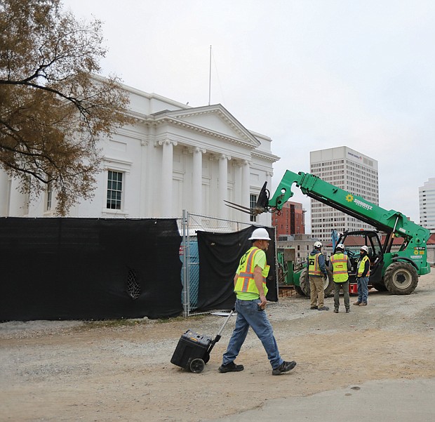 Construction continues at Virginia’s Capitol Square as seen here last month. The Capitol Visitor Center has been closed to the public since May 2 for numerous projects. According to a press release from the Department of General Services, the closure is expected to continue until next month, during which time the historic Capitol will remain open. All visitors must use the west entrance to the Capitol, where they are screened upon entry. Buses, tour groups and other large multiple-passenger vehicles can unload on the eastern-most lane of 9th Street near the Capitol Square vehicular entrance at Grace Street. Individuals who need accessibility accommodations and are arriving via a passenger vehicle can call (804) 389-5338 and arrange for drop-off inside Capitol Square. It is advised that all Capitol Square visitors should stay clear of fenced construction areas for safety reasons. The subterranean Visitor Center opened in 2007 and includes two large event/meeting rooms, a café, gift shop, exhibit space, and a media room. The closure of the Capitol Visitor Center is necessary for DGS to safely complete both critical waterproofing and tunnel construction projects.