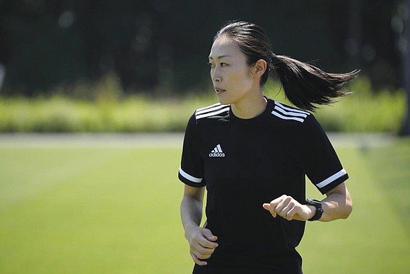 Japanese referee Yoshimi Yamashita knows that being one of three women picked to officiate matches at the World Cup — ...