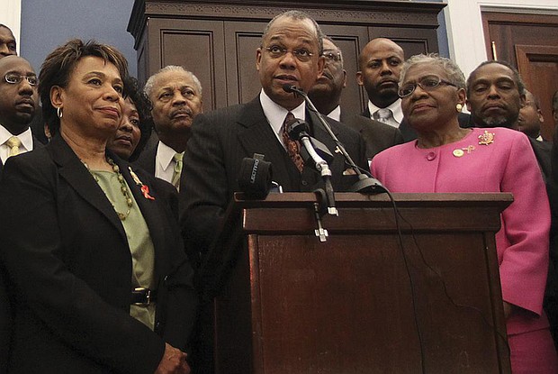 Rep. Barbara Lee, D-Calif., the Rev. Calvin Butts, and Rep. Alcee Hastings, D-Fla., are joined at podium by other church and community leaders from New York, in March 2010 on Capitol Hill. Rev. Butts welcomed generations of worshippers as well as politicial leaders from across the world at Harlem’s landmark Abyssinian Baptist Church.