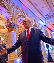 Former President Donald Trump talks to the press on midterm elections night in Palm Beach, Florida, November 8.
Mandatory Credit:	Ricardo Arduengo/Reuters