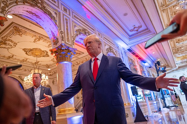 Former President Donald Trump talks to the press on midterm elections night in Palm Beach, Florida, November 8.
Mandatory Credit:	Ricardo Arduengo/Reuters