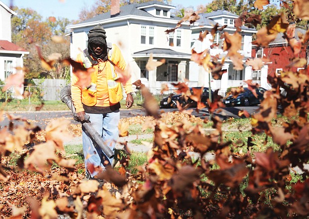 Donovan Walker, 58, of Richmond helps his godmother Caroline Bennett battle her leaves so she does not have to do it, he said on Tuesday, Nov. 8, during a short break from his task in the 2400 block of 2nd Avenue near Spruce Street. According to the City of Richmond’s website, the leaf collection program began Monday, Nov. 7, for the bagged collection option. The City allows up to 10 bags to be collected on a normal trash day. Other options provided by the city for leaf collection can be found by visiting http://www.rva.gov/public-works or by calling 3-1-1 or 646-LEAF.