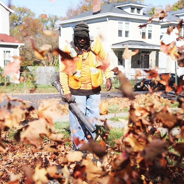 Donovan Walker, 58, of Richmond helps his godmother Caroline Bennett battle her leaves so she does not have to do it, he said on Tuesday, Nov. 8, during a short break from his task in the 2400 block of 2nd Avenue near Spruce Street. According to the City of Richmond’s website, the leaf collection program began Monday, Nov. 7, for the bagged collection option. The City allows up to 10 bags to be collected on a normal trash day. Other options provided by the city for leaf collection can be found by visiting http://www.rva.gov/public-works or by calling 3-1-1 or 646-LEAF.