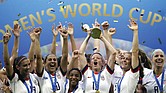 Megan Rapinoe lifts up the trophy and celebrates with teammates after winning the Women’s World Cup final soccer match in July 2019 between the United States and The Netherlands at the Stade de Lyon in Decines, outside Lyon, France.