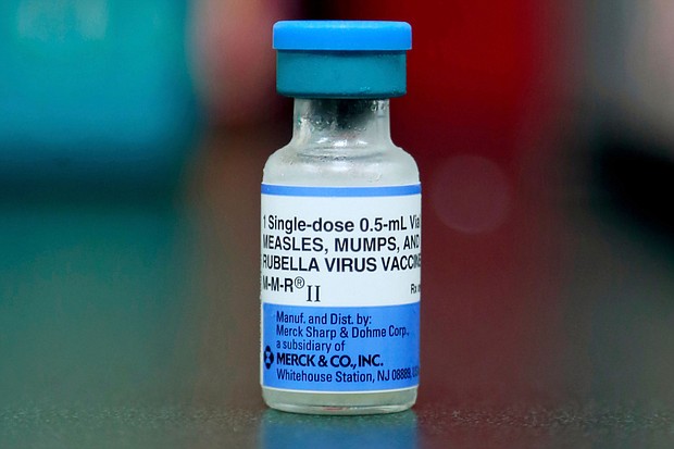 A file photo shows a vial of a measles, mumps, and rubella vaccine in Mount Vernon, Ohio, in May 2019. A growing measles outbreak in Columbus, Ohio, has sickened dozens of unvaccinated children and hospitalized nine of them.
Mandatory Credit:	Paul Vernon/AP