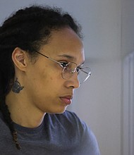 Brittney Griner stands inside a defendants' cage before the verdict in a court hearing in Khimki outside Moscow on August 4. Griner has been transferred to a penal colony in Yavas, in the western Russian region of Mordovia.
Mandatory Credit:	Evgenia Novozhenina/Pool/Reuters