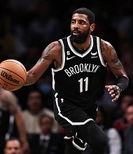 Brooklyn Nets star Kyrie Irving, who was suspended for at least five games by the team for comments made after sharing a link to an antisemitic movie on social media, is due this week to miss his eighth consecutive game. Irving is seen here on November 1 in New York.
Mandatory Credit:	Dustin Satloff/Getty Images
