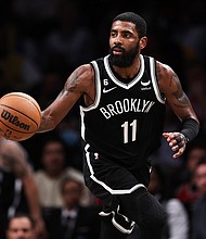 Brooklyn Nets star Kyrie Irving, who was suspended for at least five games by the team for comments made after sharing a link to an antisemitic movie on social media, is due this week to miss his eighth consecutive game. Irving is seen here on November 1 in New York.
Mandatory Credit:	Dustin Satloff/Getty Images