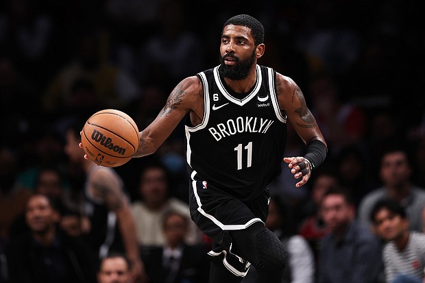 Brooklyn Nets star Kyrie Irving, who was suspended for at least five games by the team for comments made after sharing a link to an antisemitic movie on social media, is due this week to miss his eighth consecutive game. Irving is seen here on November 1 in New York.
Mandatory Credit:	Dustin Satloff/Getty Images