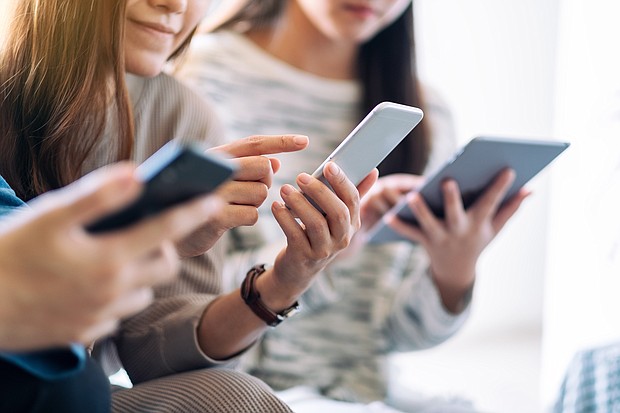 Teens say their experience on social media is better than you think.
Mandatory Credit:	Adobe Stock