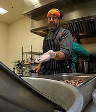 Recently, under the direction of catering chef Adam Kreisel, volunteers turned donated vegetables and steak trimmed from restaurant meals into steak teriyaki for 60 low-income families.
Mandatory Credit:	KSL
