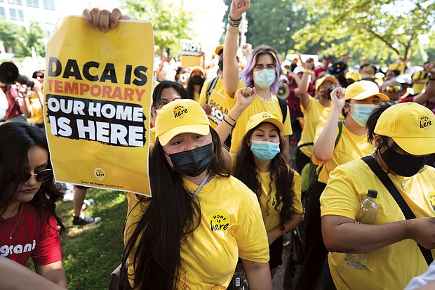 Susana Lujano, left, a Dreamer from Mexico who lives in Houston, joins other activists to rally in support of the Deferred Action for Childhood Arrivals program, also known as DACA, at the US Capitol in Washington, DC, on June 15.
Mandatory Credit:	J. Scott Applewhite/AP/File