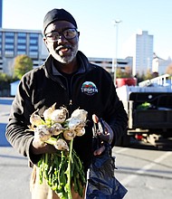 Chris Thigpen, 57, of Washington, D.C., is the owner of Thigpen Farms where he grows everything in South Carolina from his highly sought after sweet seeded watermelons in the summer, along with berries, mushrooms, kale, mustard greens, collard greens, turnips, sweet potatoes, pecans and more. Mr. Thigpen retired after a 15-year career in IT, printing and media with IBM and Eastman Kodak. He is the founder of Pure Shea, a natural products line of handmade soap and lotion with retail stores in Detroit and Baltimore. On Sunday, Nov. 20, he participated in the last RVA’s Black Farmers Market before Thanksgiving Day.